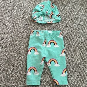 Monica and Andy matching pants and hat rainbow